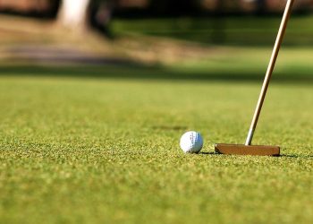The Art of Golf Love: Couples on the Driving Range